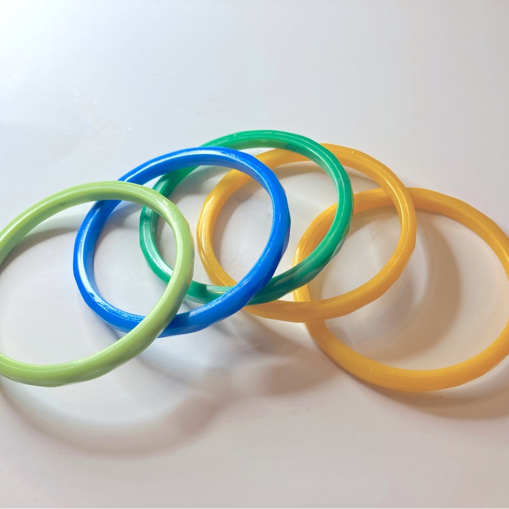 Just for fun, acrylic, bracelets in four colors.